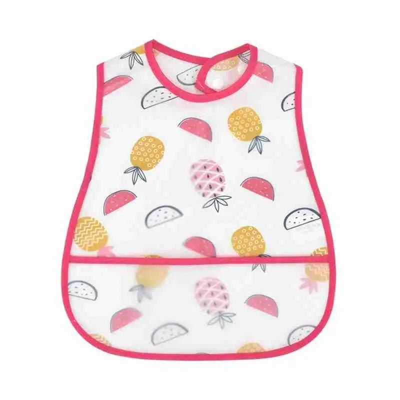 Bavoir assorti sur table à langer | accessoire indispensable du quotidien