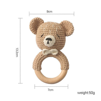 Détail du visage de l'ourson hochet – design adorable et souriant