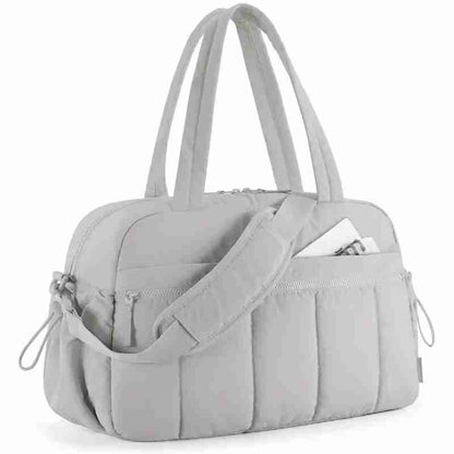 Détail des poches du sac à langer | rangements pratiques et accessibles