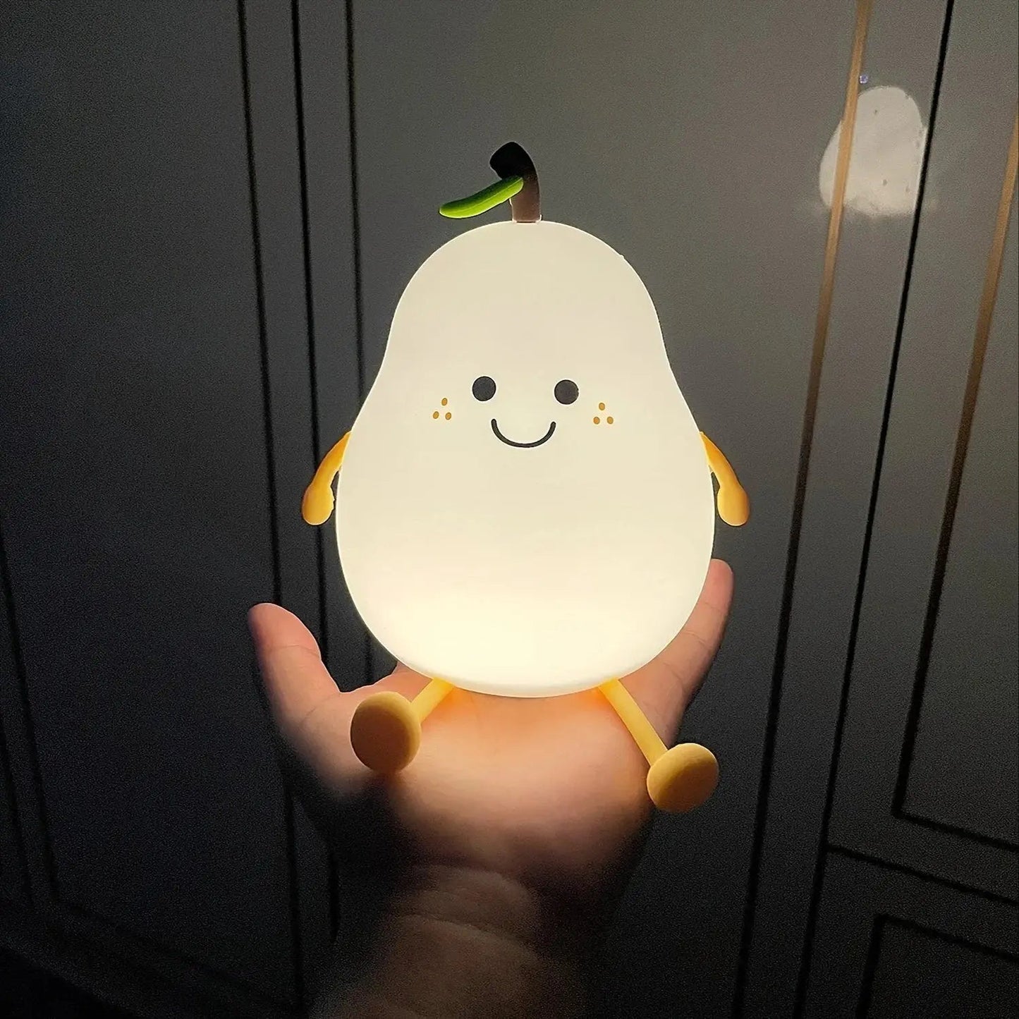 Détail bouton veilleuse bébé | commande simple et intuitive pour les parents